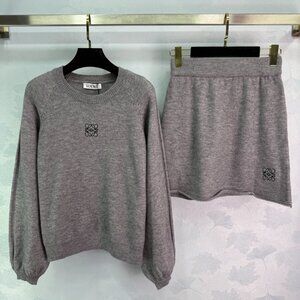 LOEWE navy blue knit suit, round neck long-sleeved top paired with a skirt